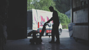 A floorgrinding machine, Scanmaskin 18, grinding the concrete floor.